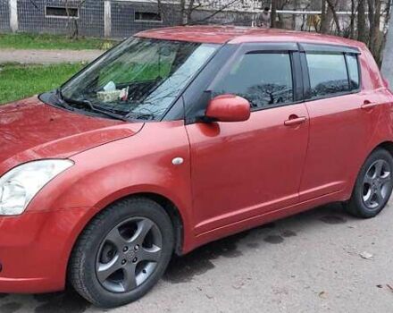 Красный Сузуки Свифт, объемом двигателя 1.49 л и пробегом 168 тыс. км за 7300 $, фото 1 на Automoto.ua