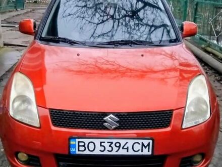 Красный Сузуки Свифт, объемом двигателя 1.33 л и пробегом 163 тыс. км за 4700 $, фото 1 на Automoto.ua