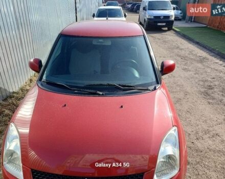 Красный Сузуки Свифт, объемом двигателя 1.5 л и пробегом 235 тыс. км за 6300 $, фото 1 на Automoto.ua