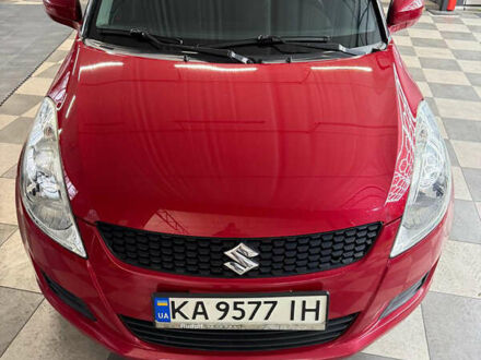 Червоний Сузукі Свифт, об'ємом двигуна 1.24 л та пробігом 140 тис. км за 7500 $, фото 1 на Automoto.ua