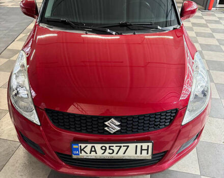 Червоний Сузукі Свифт, об'ємом двигуна 1.24 л та пробігом 140 тис. км за 7500 $, фото 1 на Automoto.ua