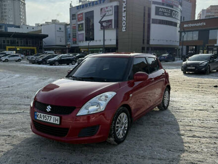 Червоний Сузукі Свифт, об'ємом двигуна 1.24 л та пробігом 145 тис. км за 8500 $, фото 1 на Automoto.ua