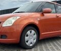 Желтый Сузуки Свифт, объемом двигателя 1.3 л и пробегом 228 тыс. км за 4000 $, фото 1 на Automoto.ua
