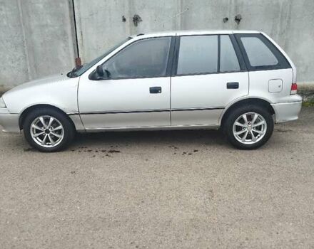 Серый Сузуки Свифт, объемом двигателя 1.3 л и пробегом 196 тыс. км за 1900 $, фото 3 на Automoto.ua