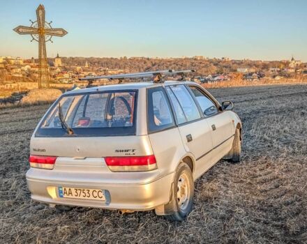 Сірий Сузукі Свифт, об'ємом двигуна 1.3 л та пробігом 233 тис. км за 1540 $, фото 4 на Automoto.ua