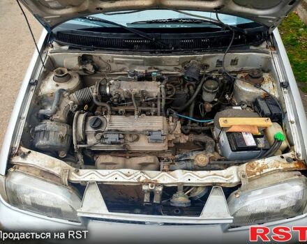 Серый Сузуки Свифт, объемом двигателя 1.3 л и пробегом 196 тыс. км за 1900 $, фото 8 на Automoto.ua