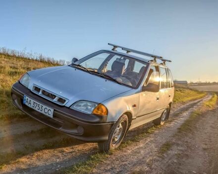 Сірий Сузукі Свифт, об'ємом двигуна 1.3 л та пробігом 233 тис. км за 1540 $, фото 1 на Automoto.ua