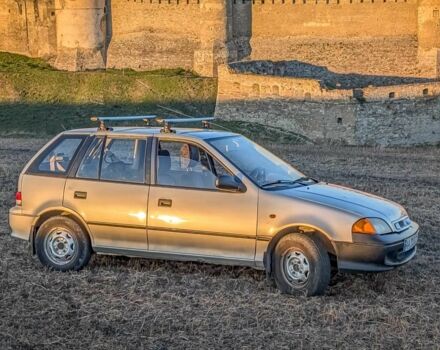 Сірий Сузукі Свифт, об'ємом двигуна 1.3 л та пробігом 233 тис. км за 1540 $, фото 14 на Automoto.ua