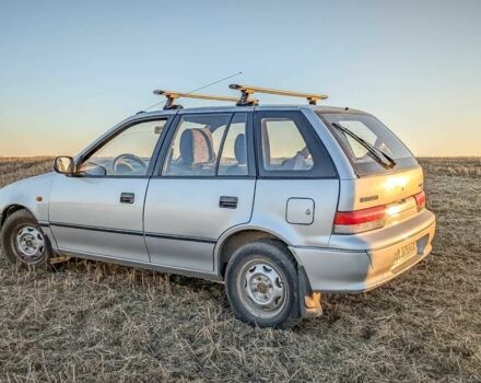 Сірий Сузукі Свифт, об'ємом двигуна 1.3 л та пробігом 233 тис. км за 1540 $, фото 5 на Automoto.ua