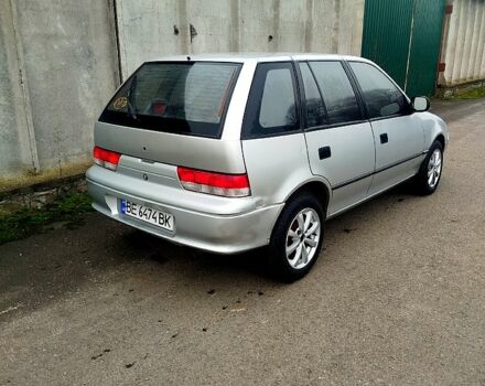 Серый Сузуки Свифт, объемом двигателя 1.3 л и пробегом 196 тыс. км за 1900 $, фото 2 на Automoto.ua