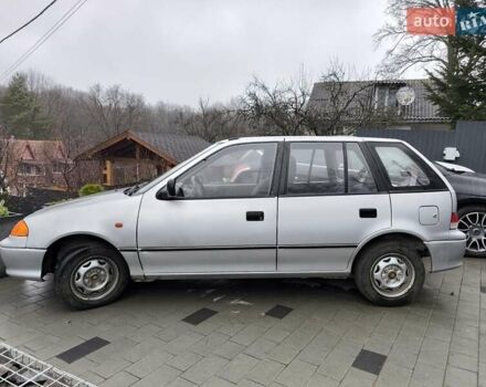 Серый Сузуки Свифт, объемом двигателя 1.3 л и пробегом 56 тыс. км за 2550 $, фото 2 на Automoto.ua