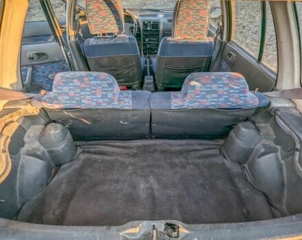 Сірий Сузукі Свифт, об'ємом двигуна 1.3 л та пробігом 233 тис. км за 1540 $, фото 12 на Automoto.ua