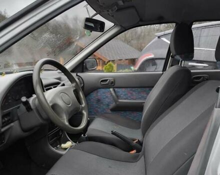 Серый Сузуки Свифт, объемом двигателя 1.3 л и пробегом 56 тыс. км за 2550 $, фото 3 на Automoto.ua