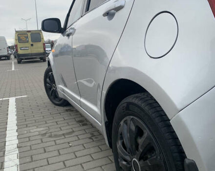 Сірий Сузукі Свифт, об'ємом двигуна 1.3 л та пробігом 229 тис. км за 4250 $, фото 12 на Automoto.ua