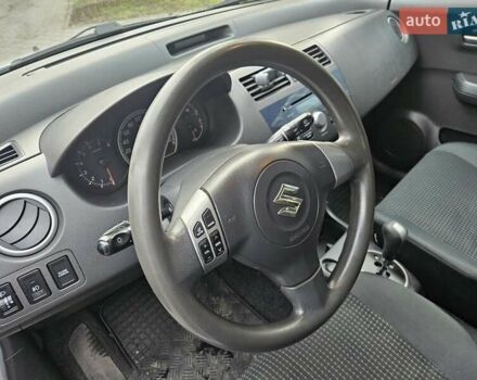 Серый Сузуки Свифт, объемом двигателя 1.33 л и пробегом 193 тыс. км за 5500 $, фото 8 на Automoto.ua