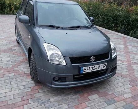 Серый Сузуки Свифт, объемом двигателя 1.49 л и пробегом 129 тыс. км за 6000 $, фото 1 на Automoto.ua