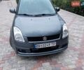 Серый Сузуки Свифт, объемом двигателя 1.49 л и пробегом 129 тыс. км за 6000 $, фото 1 на Automoto.ua