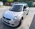 Сірий Сузукі Свифт, об'ємом двигуна 1.2 л та пробігом 214 тис. км за 4600 $, фото 1 на Automoto.ua