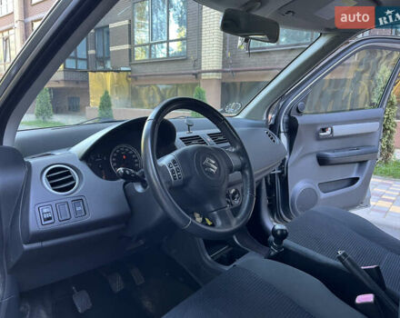 Сірий Сузукі Свифт, об'ємом двигуна 1.3 л та пробігом 189 тис. км за 4900 $, фото 22 на Automoto.ua