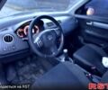 Серый Сузуки Свифт, объемом двигателя 1.3 л и пробегом 100 тыс. км за 3550 $, фото 6 на Automoto.ua