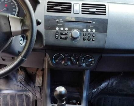 Сірий Сузукі Свифт, об'ємом двигуна 1.49 л та пробігом 199 тис. км за 5500 $, фото 15 на Automoto.ua