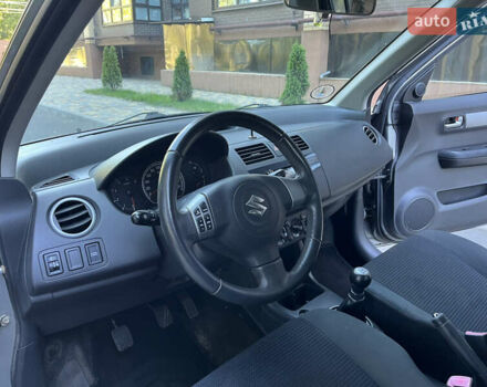 Сірий Сузукі Свифт, об'ємом двигуна 1.3 л та пробігом 189 тис. км за 4900 $, фото 23 на Automoto.ua