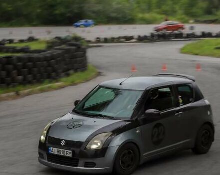 Сірий Сузукі Свифт, об'ємом двигуна 1.49 л та пробігом 185 тис. км за 4500 $, фото 14 на Automoto.ua