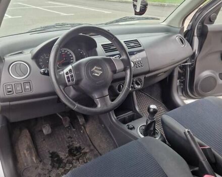 Серый Сузуки Свифт, объемом двигателя 1.33 л и пробегом 190 тыс. км за 4200 $, фото 10 на Automoto.ua