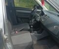 Сірий Сузукі Свифт, об'ємом двигуна 1.3 л та пробігом 87 тис. км за 5630 $, фото 1 на Automoto.ua