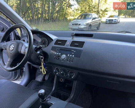 Сірий Сузукі Свифт, об'ємом двигуна 1.3 л та пробігом 189 тис. км за 4900 $, фото 27 на Automoto.ua