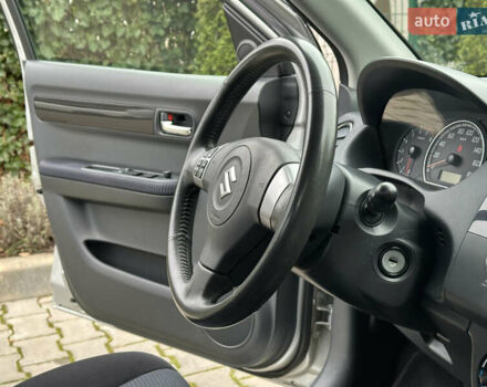 Серый Сузуки Свифт, объемом двигателя 1.49 л и пробегом 24 тыс. км за 9300 $, фото 37 на Automoto.ua