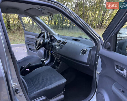 Сірий Сузукі Свифт, об'ємом двигуна 1.3 л та пробігом 189 тис. км за 4900 $, фото 25 на Automoto.ua