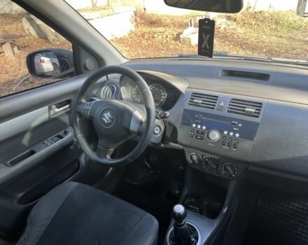 Сірий Сузукі Свифт, об'ємом двигуна 1.3 л та пробігом 205 тис. км за 3650 $, фото 12 на Automoto.ua