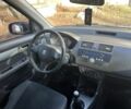 Сірий Сузукі Свифт, об'ємом двигуна 1.3 л та пробігом 205 тис. км за 3650 $, фото 12 на Automoto.ua