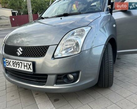 Сірий Сузукі Свифт, об'ємом двигуна 1.49 л та пробігом 143 тис. км за 8031 $, фото 18 на Automoto.ua