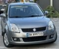 Сірий Сузукі Свифт, об'ємом двигуна 1.49 л та пробігом 143 тис. км за 8031 $, фото 6 на Automoto.ua