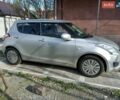 Серый Сузуки Свифт, объемом двигателя 1.24 л и пробегом 174 тыс. км за 6300 $, фото 1 на Automoto.ua
