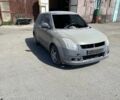 Серый Сузуки Свифт, объемом двигателя 1.3 л и пробегом 188 тыс. км за 2150 $, фото 1 на Automoto.ua