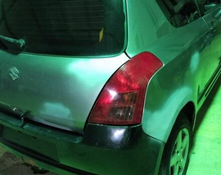 Сірий Сузукі Свифт, об'ємом двигуна 1.3 л та пробігом 167 тис. км за 1900 $, фото 4 на Automoto.ua