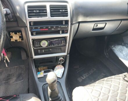 Сірий Сузукі Свифт, об'ємом двигуна 1.3 л та пробігом 350 тис. км за 1800 $, фото 5 на Automoto.ua