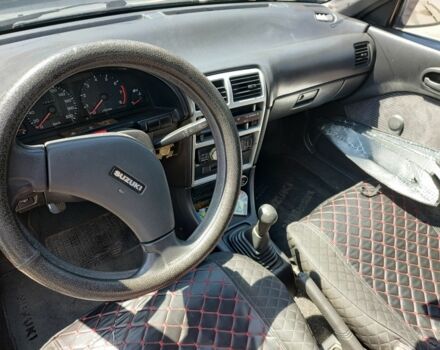 Сірий Сузукі Свифт, об'ємом двигуна 1.3 л та пробігом 350 тис. км за 1800 $, фото 4 на Automoto.ua