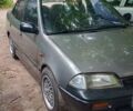 Серый Сузуки Свифт, объемом двигателя 1.59 л и пробегом 300 тыс. км за 1250 $, фото 1 на Automoto.ua
