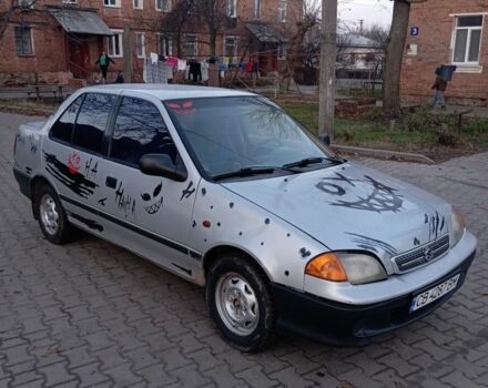 Серый Сузуки Свифт, объемом двигателя 1.3 л и пробегом 111 тыс. км за 1300 $, фото 1 на Automoto.ua