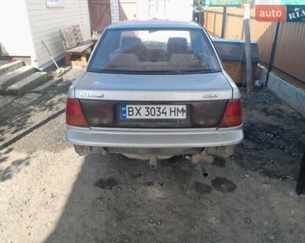 Серый Сузуки Свифт, объемом двигателя 1.3 л и пробегом 350 тыс. км за 500 $, фото 1 на Automoto.ua