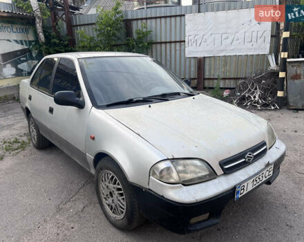 Серый Сузуки Свифт, объемом двигателя 1.3 л и пробегом 157 тыс. км за 800 $, фото 1 на Automoto.ua