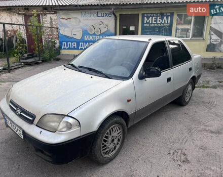Серый Сузуки Свифт, объемом двигателя 1.3 л и пробегом 157 тыс. км за 800 $, фото 2 на Automoto.ua