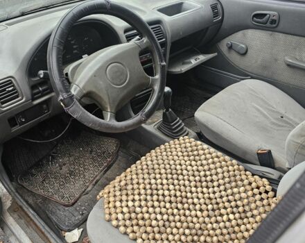 Серый Сузуки Свифт, объемом двигателя 1.3 л и пробегом 234 тыс. км за 550 $, фото 2 на Automoto.ua