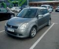 Серый Сузуки Свифт, объемом двигателя 1.3 л и пробегом 180 тыс. км за 4500 $, фото 1 на Automoto.ua