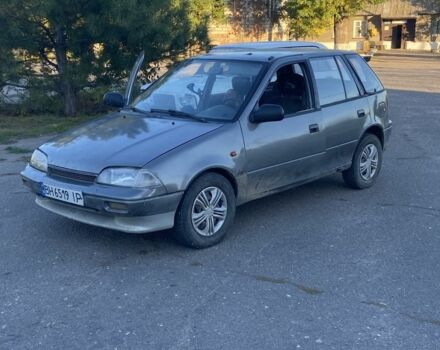 Серый Сузуки Свифт, объемом двигателя 1 л и пробегом 24 тыс. км за 900 $, фото 2 на Automoto.ua