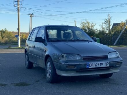 Серый Сузуки Свифт, объемом двигателя 1 л и пробегом 24 тыс. км за 900 $, фото 1 на Automoto.ua